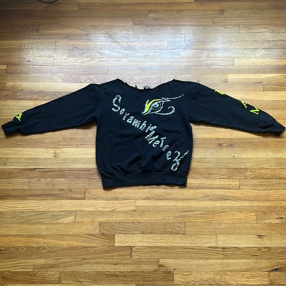 Handmade open neck long sleeve sweater.